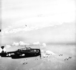 Planes from USS Essex on a raid over Japan on 10 Jul 1945 with Mt Fuji in the background. Plane in foreground is a TBM Avenger and those beyond are SB2C Helldivers.