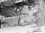 Bombed hangar at Mourmelon-le-Grand, France after a German attack on the airfield, 14 May 1940; note wreck of a Miles Magister and at least two Fairey Battle aircraft
