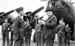 US Secretary of War Henry Stimson awarding the first Medal of Honor to be awarded to an enlisted personnel to Staff Sergeant Maynard H. Smith, Station 111, Bedfordshire, England, United Kingdom, mid-1943, photo 2 of 2