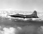 B-17E Fortress in flight from its base at Hickam Field, Hawaii between Dec 1941 and Apr 1942. On 5 Apr 1942 this bomber crashed into Mt Keahiakahoe on Oahu while returning from a patrol killing all 11 aboard.