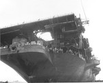 An underside view of the USS Randolph flight deck 12 Mar 1945, the day after a Yokosuka P1Y Ginga (Frances) special attack aircraft crashed into Randolph’s stern as she rode at anchor in the Ulithi lagoon.