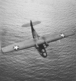 Overhead aerial view of a Consolidated PBY Catalina patrol aircraft over the Atlantic, late 1942.