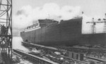 A badly retouched photograph of the St. Louis being launched from Slip IV of Bremer Vulkan shipyard, Germany, 2 Aug 1928