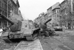 ISU-152 self-propelled guns and a T-34-85 tank on Kisfaludy Street, Budapest, Hungary, 30 Oct 1956, photo 2 of 4