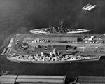 Battleships USS Iowa (bottom) and USS Maryland (top) alongside Pier 91 in Seattle, Washington, United States, 17 Oct 1945.