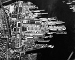 Aerial view of the Boston Navy Yard, 8 Mar 1943. Note the three-masted square-rigged frigate and veteran of the War of 1812 USS Constitution near the top of the image.