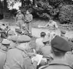 General Montgomery meeting with war correspondents at his headquarters at Château de Cruelly, France during the Normandy campaign, 11 Jun 1944.