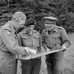 General Brian Horrocks of British XXX Corps, Field Marshal Bernard Montgomery, and Prince Bernhard of the Netherlands discuss the upcoming Operation Market Garden at Montgomery’s headquarters in France, 8 Sep 1944.