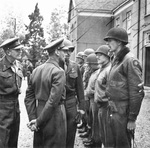 British General Brian Horrocks (left) and King George VI of the United Kingdom meeting with the men of the American 82nd Airborne Division who captured the bridges at Grave and Nijmegen during Market Garden.