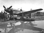 A-36A Mustang attack aircraft on a muddy airfield in Italy, circa early 1944. Note two “kill” markings on the engine cowl.