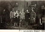 US Army bomb disposal personnel Irving Byington and William Woolfolk with civilians, La Louvière, Belgium, May 1945