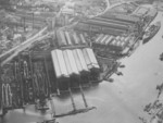 Aerial view of Germaniawerft yard in Kiel, Germany, early 1900s; note battleship Deutschland or Schleswig-Holstein under construction, 4 torpedo boat slips ahead of the battleship, and building slips V through VIII