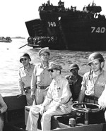 General Douglas MacArthur in an LCVP getting ready to go ashore on Lingayen Gulf Blue 1 landing beach, Luzon, Philippines, 9 Jan 1945. Note Chief of Staff Lt General R.K. Sutherland beside him.