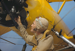 US Marine Corps lieutenant posing next to his N3N glider-towing biplane, Page Field, Parris Island, South Carolina, United States, May 1942, photo 3 of 3