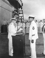 Admiral Chester Nimitz presenting the Navy Cross to Aviation Chief Machinist