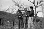 Chinese soldier teaching Harrison Forman rifle operations, Changsha, Hunan Province, China, 1942