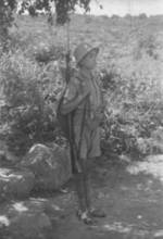 Young Chinese military cadet standing guard with ZB vz. 24 rifle, Hubei Province, China, 1942, photo 1 of 2