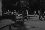 Sandbags and barbed wire on a street in Hankou, Wuhan, Hubei Province, China, 10 Aug 1937, photo 2 of 2