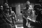 Japanese prisoner of war being questioned by journalists, Changde, Hunan Province, China, 24 Dec 1943
