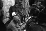Japanese prisoner of war being questioned by journalists, Changde, Hunan Province, China, 24 Dec 1943