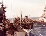 Battleship USS Iowa and carrier USS Shangri-La receiving fuel from oiler USS Cahaba, 8 Jul 1945. Photo 3 of 5.