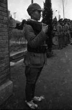 Chinese soldier with Mauser C96 handgun with stock, Chongqing, China, 1940s