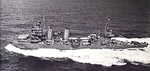 USS New Orleans underway from Sydney, Australia after being fitted with a temporary bow because she was struck by a torpedo in the Battle of Tassafaronga that blew off 150 feet of her bow.