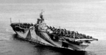 Carrier Ticonderoga off San Diego, California, United States, 16 Sep 1944; note extra aircraft loaded on deck destined for Hawaii, and camouflage pattern Measure 33 Design 10a. Photo 2 of 2.