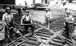 Yardmen laying track during the construction of the Puget Sound Naval Shipyard, Bremerton, Washington, United States, circa 1917.