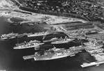 Aerial view of the piers and drydocks at the Puget Sound Naval Shipyard, Bremerton, Washington, United States, 1940.