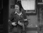 Female resistance fighter with Błyskawica submachine gun, Warsaw, Poland, Aug 1944