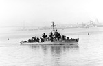USS Hoel underway in San Francisco Bay, California, United States, 7 Aug 1943 with the San Francisco-Oakland Bay Bridge in the background.