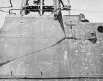 Bullet holes marked for repair on the fairwater of USS Growler while at the New Farm Submarine Base, Brisbane, Queensland, Australia, mid-Feb 1943.