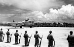 Aboard two Mitsubishi G4M ‘Betty’ bombers in surrender markings, a Japanese delegation stopped at Ie Jima, Ryukyu Islands en route Manila, Philippines for a surrender briefing, 19 Aug 1945. Photo 02 of 12.