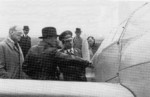 Aircraft designiner Anderson showing Generaloberst Ernt Udet the two-part entrance door of a Bü 181 V1 Bestmann aircraft, 1939; note C. C. Bücker at far left