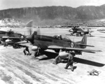 North American F-51D Mustang fighters of No. 2 Squadron of the South African Air Force at the Chinhae Air Base (now Jinhae), South Korea, 1 May 1951. Note wing-mounted HVAR air-to-surface rockets.