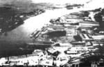 Aerial photo of Oderwerke facilities at Stettin, Germany, 1930s; note floating drydock and two ships under construction in slips