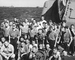 38 of the 41 officers and men from the USS Hull rescued by the USS Tabberer gathered on Tabberer’s quarterdeck after arrival at the Ulithi anchorage, 22 Dec 1944.