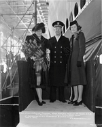 Submarine Bowfin sponsor Mrs. Jane Gawne, Rear Admiral Thomas Withers, and Bowfin Maid of honor Miss Christine Gawne stand ready to christen the boat prior to her launch at the Portsmouth Navy Yard, 7 Dec 1942.