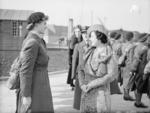 Queen Elizabeth inspecting WAAF personnel at RAF Innsworth, Gloucester, Gloucestershire, England, United Kingdom, 1940s; the officer behind the queen was Assistant Section Officer G. H. Caffin