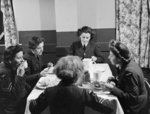 WAAF members having a meal, possibly RAF Bridgnorth, Stanmore, England, United Kingdom, 1942
