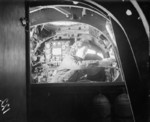 WAAF electrician repairing the switches on the engines panel in a Handley Page Halifax aircraft at a Bomber Command station, United Kingdom, 1942-1945
