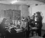 RAF and WAAF intelligence officers and their staff working in the Map Section in the Operations Block at Headquarters, Bomber Command, RAF High Wycombe, Buckinghamshire, England, United Kingdom, 1942-1945