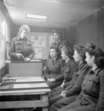 WAAF members being given instructions on filing during a secretarial course of the RAF Educational and Vocational Training Scheme, United Kingdom, date unknown