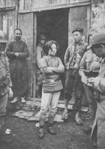 Cheng Benhua and other resistance fighters being led out of their place of imprisonment, to be prepared for execution, Anhui Province, China, Apr 1938