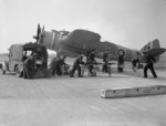 WAAF personnel unloading boxes of 20mm Hispano cannon shells while RAF armourers loaded them for a Beaufighter Mark VI aircraft of No. 96 Squadron RAF at RAF Honiley, Wroxall, Warwickshire, England, United Kingdom, 1943-1945