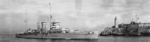 HMS York entering Havana Harbor, Cuba, 14 Jan 1938; note Castillo De Los Tires Reyes Del Morro in background