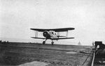 First aircraft landing aboard USS Bogue, 30 Oct 1942 in Puget Sound, Washington, United States. The plane is a Curtiss SOC-3A Seagull flown by Bogue’s first Air Officer, Commander Jack Monroe.
