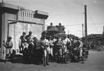 Harrison Forman with Shanghai Volunteer Corp personnel with armored car and motorcycle, French Concession Zone, Shanghai, China, mid-1937