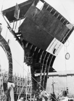 Transfer of after peak section of a Liberty ship under construction at Kaiser Richmond No. 2 Yard, Richmond, California, United States, 1940s